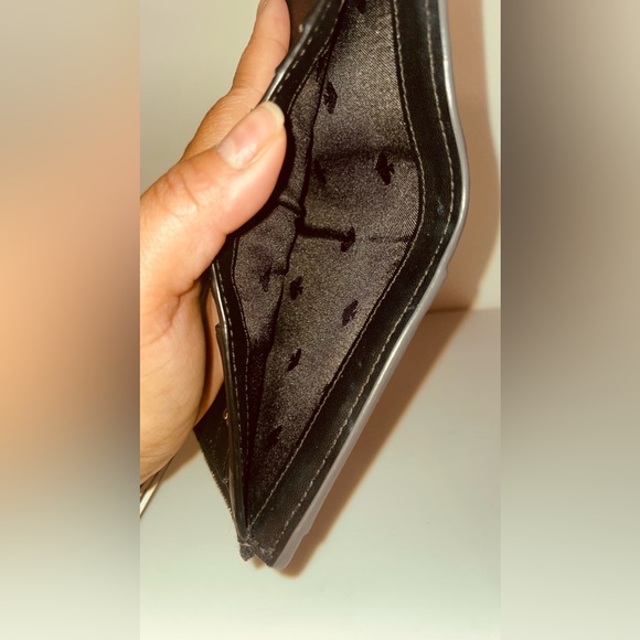 Kate Spade small zip around wallet. Black and white trim. - Picture 9 of 13